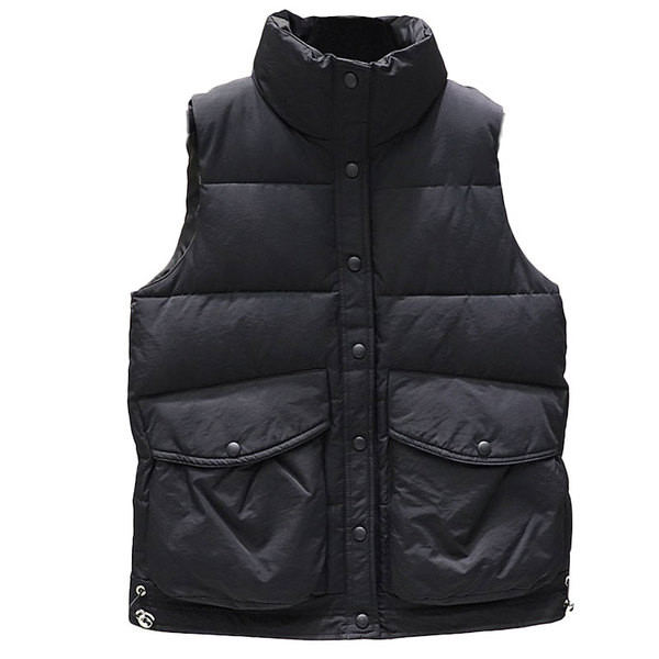 Valge ja musta värvi nööpide ja lukuga naiste vest