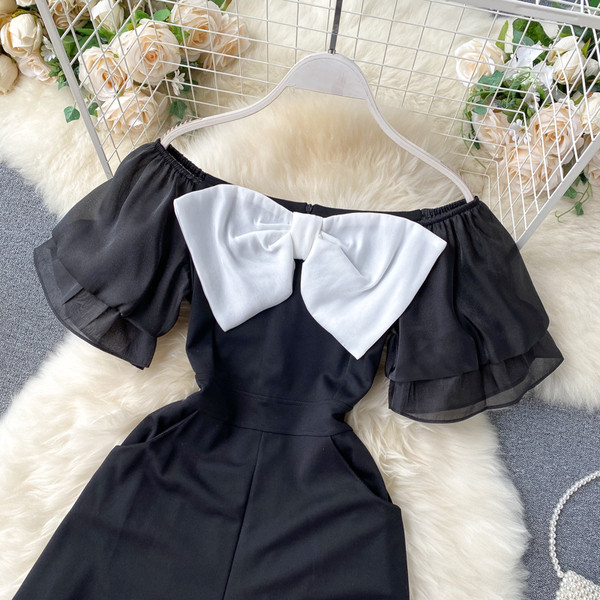 Női overall csónakos nyakkivágással és szalaggal