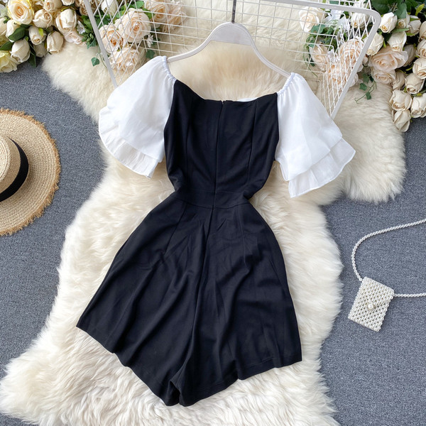 Női overall csónakos nyakkivágással és szalaggal