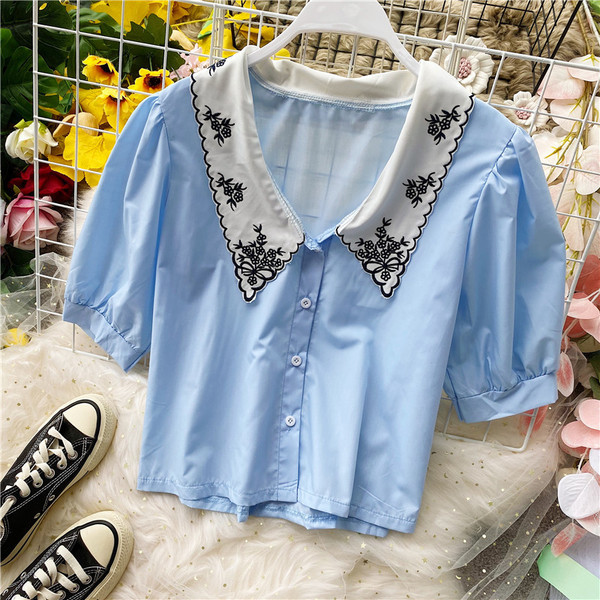 Modern női ing hímzéssel és 3/4-es ujjakkal