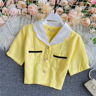 Női aktuális rövid ing klasszikus gallérral és zsebekkel