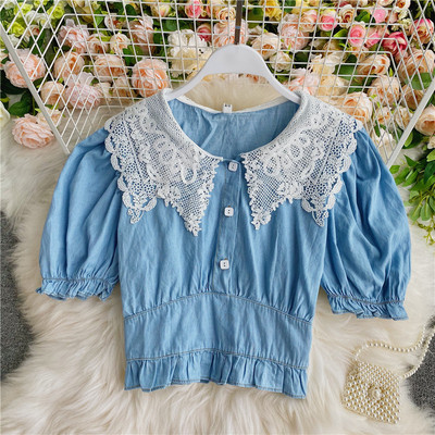 Praegune naiste lühike särk pitsi ja ovaalse kaelusega