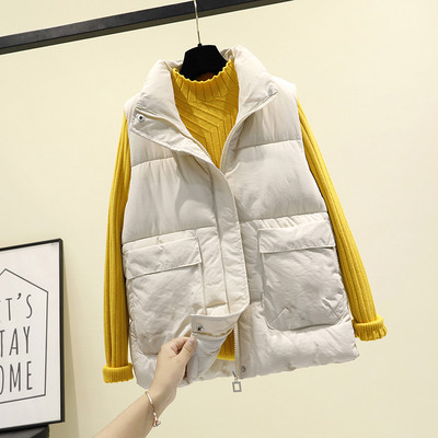 Alkalmi női mellény hímzéssel és cipzárral