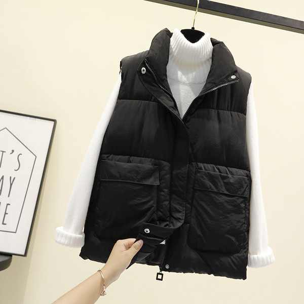 Alkalmi női mellény hímzéssel és cipzárral