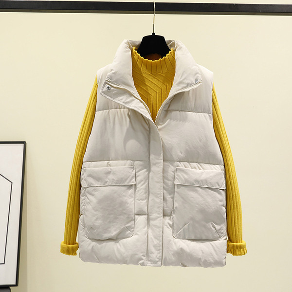 Alkalmi női mellény hímzéssel és cipzárral