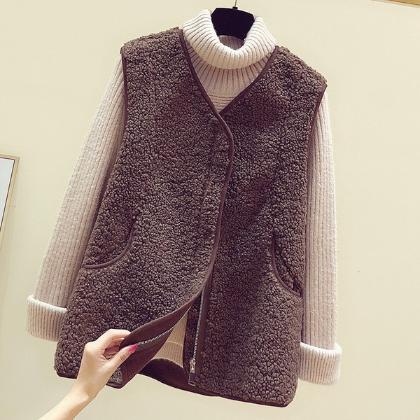 Női pehelymellény cipzárral és zsebbel több színben