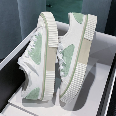 Fűzős, lapos talpú női textil tornacipő