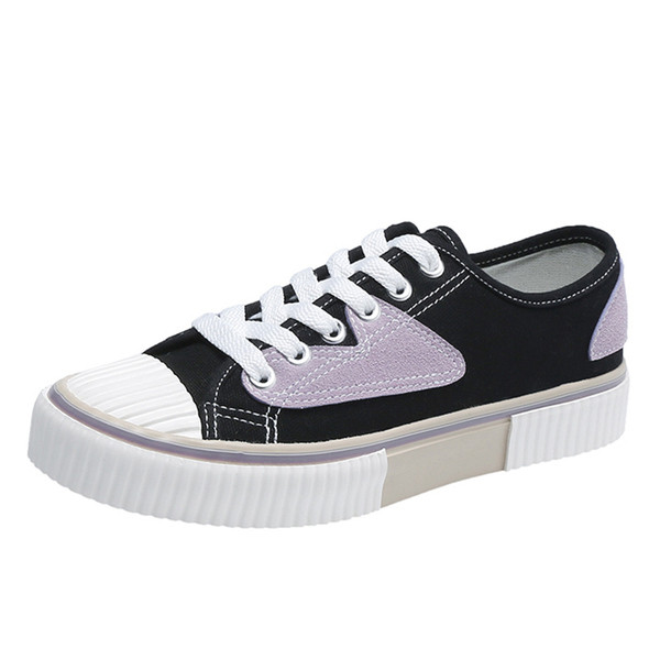 Fűzős, lapos talpú női textil tornacipő