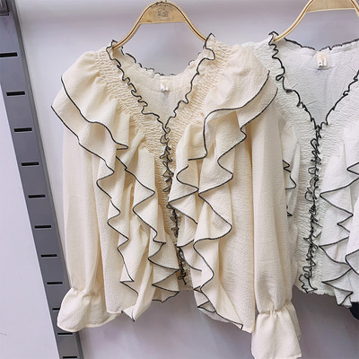 Modern női ing hosszú ujjal és spitz nyakkivágással