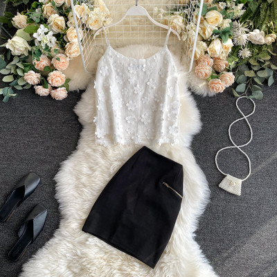 Moderns sieviešu kombinezons un svārki ar augstu vidukli