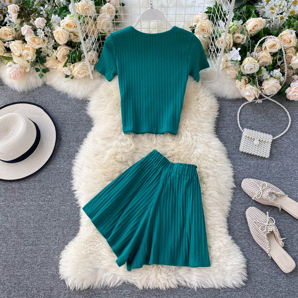 Plisseeritud naiste komplekt pluusist ja kõrge vöökohaga pükstest