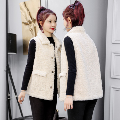 Jelenlegi női mellény zsebekkel, gombokkal