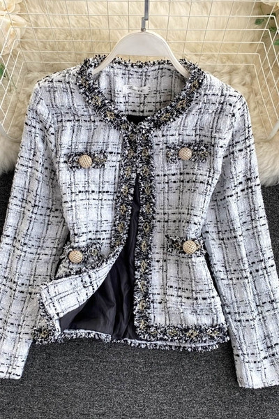 Női alkalmi kabát fekete-fehér zsebekkel