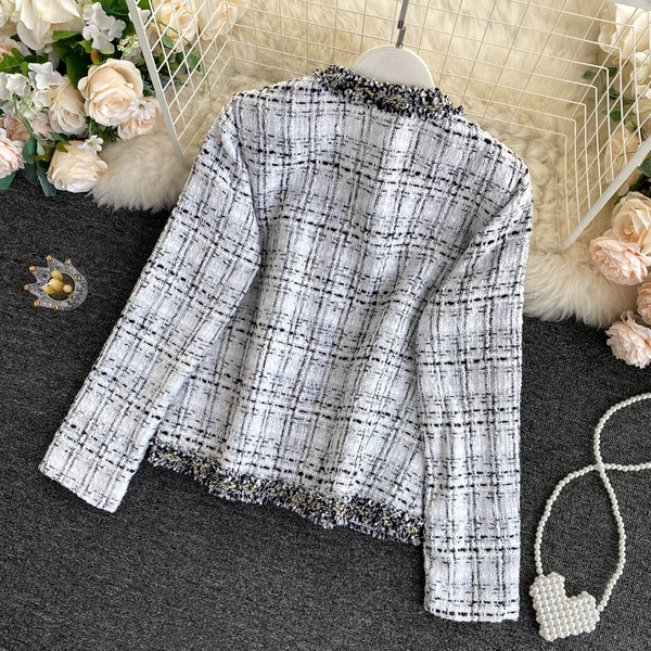 Női alkalmi kabát fekete-fehér zsebekkel