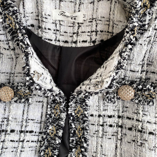 Női alkalmi kabát fekete-fehér zsebekkel