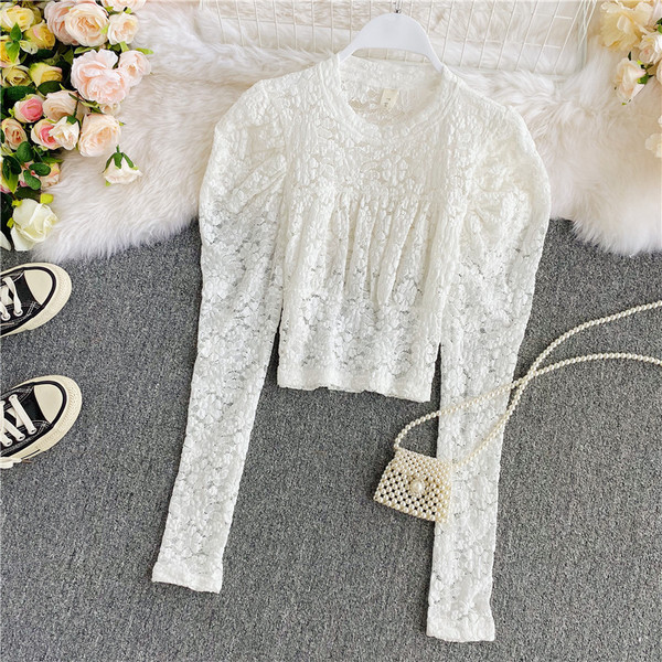 Női csipke ing hosszú ujjal és ovális nyakkivágással