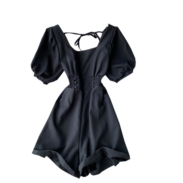 Modern női overál rövid ujjal és övvel