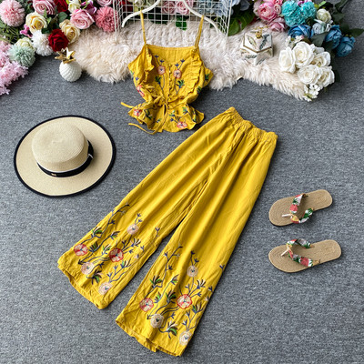 Stiilne naiste topi ja pikkade lillemustriga pükste komplekt