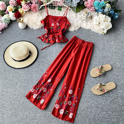 Stiilne naiste topi ja pikkade lillemustriga pükste komplekt