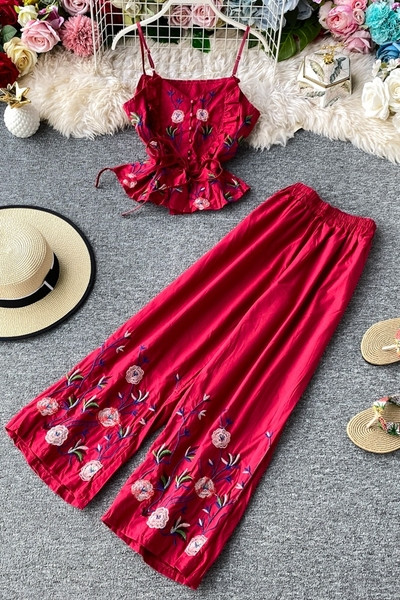 Stiilne naiste topi ja pikkade lillemustriga pükste komplekt