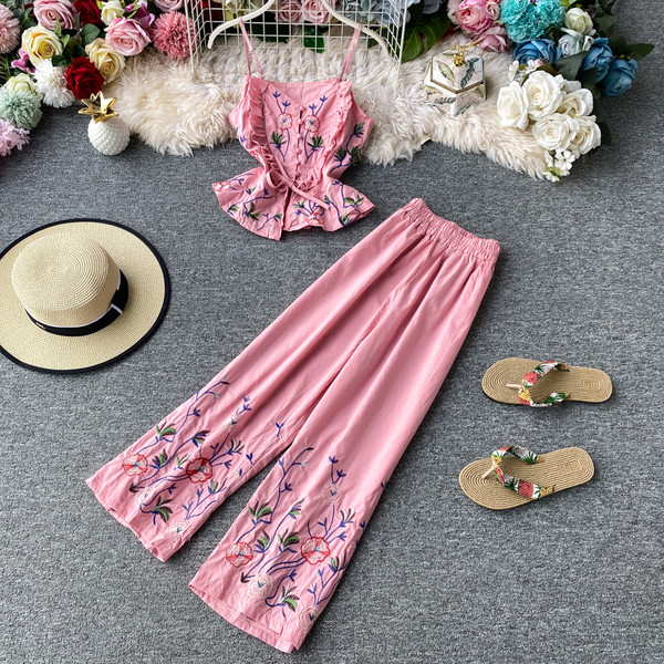 Stiilne naiste topi ja pikkade lillemustriga pükste komplekt