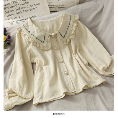 Aktuális női ing hímzéssel és spitz nyakkivágással