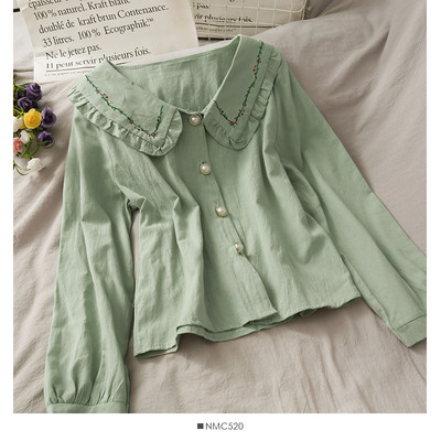 Aktuális női ing hímzéssel és spitz nyakkivágással