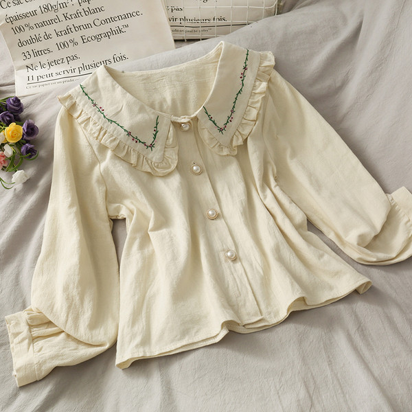 Aktuális női ing hímzéssel és spitz nyakkivágással