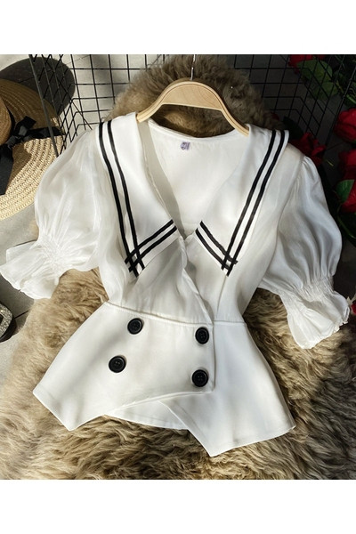 Naiste kaasaegne asümmeetrilise mustriga nööpidega särk