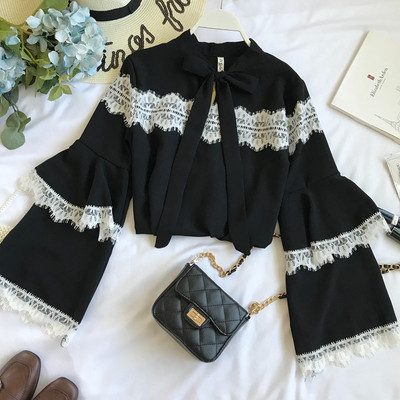 Modern női ing széles ujjal és gallérral szalaggal