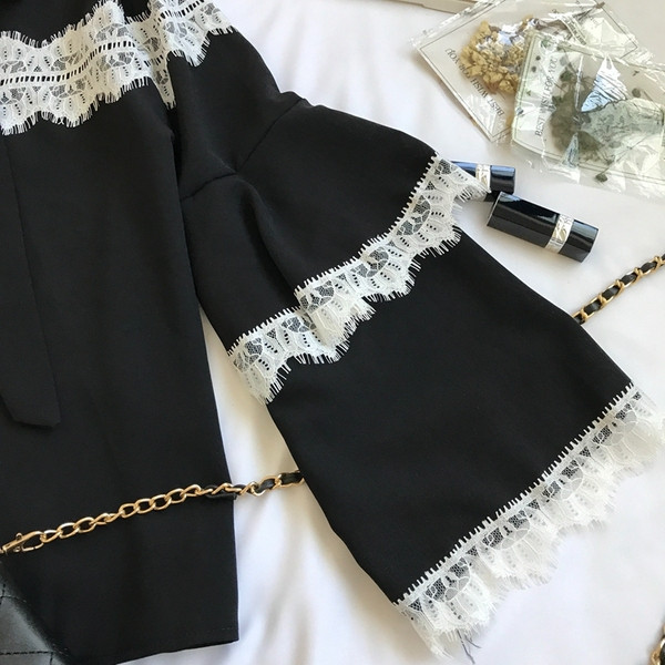 Modern női ing széles ujjal és gallérral szalaggal