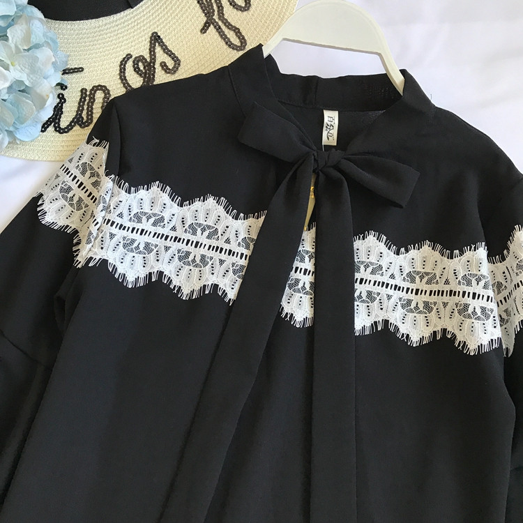 Modern női ing széles ujjal és gallérral szalaggal