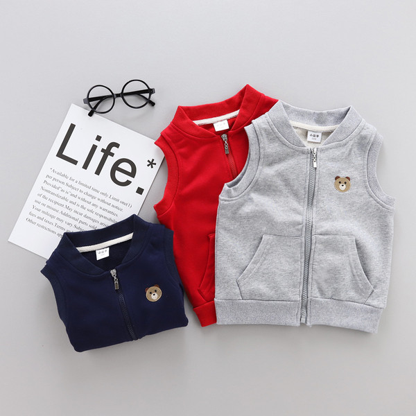 Taskute ja tikanditega sportlik lastevest poistele