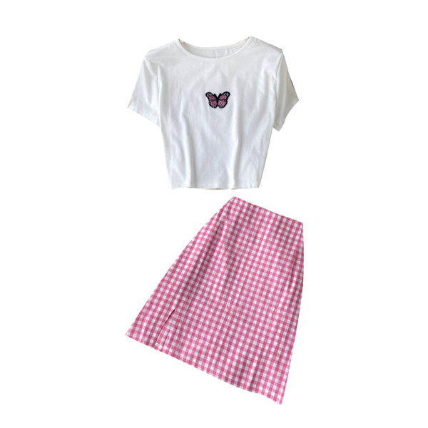 Moderns sieviešu komplekts, kurā ietilpst rūtaini svārki un blūze