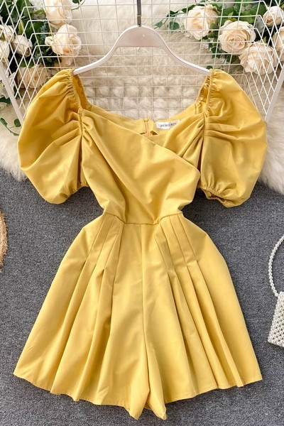 Modern női overál lehajtható ujjakkal