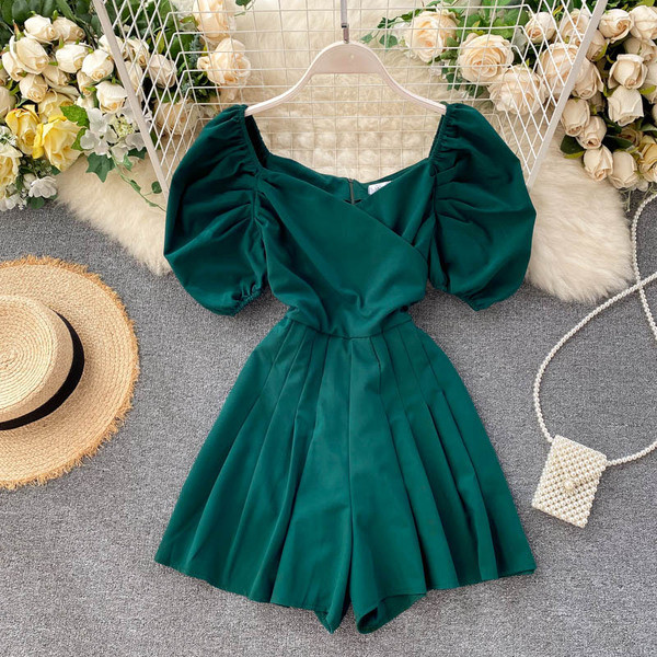 Modern női overál lehajtható ujjakkal