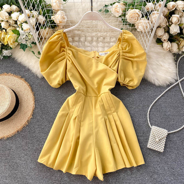 Modern női overál lehajtható ujjakkal