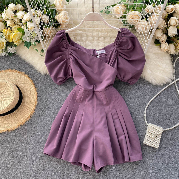 Modern női overál lehajtható ujjakkal