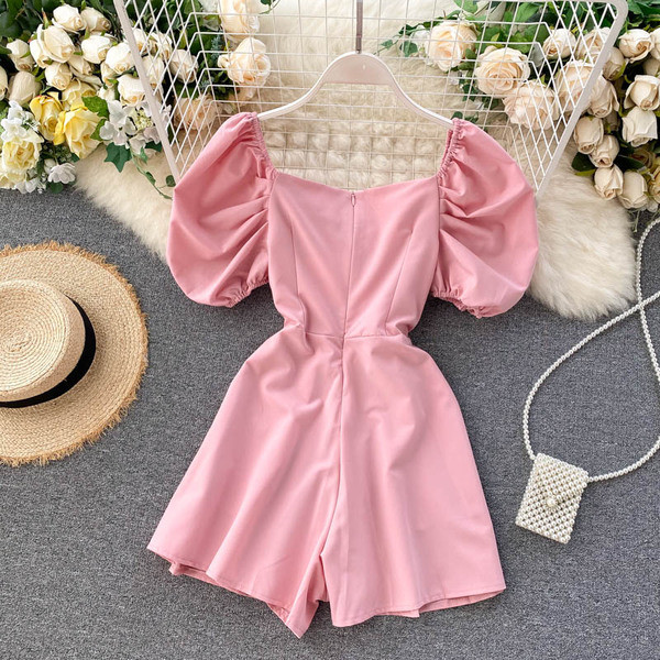 Modern női overál lehajtható ujjakkal