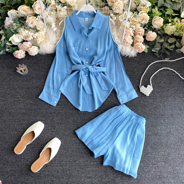 Sieviešu kreklu komplekts ar atkailinātiem pleciem un biksēm