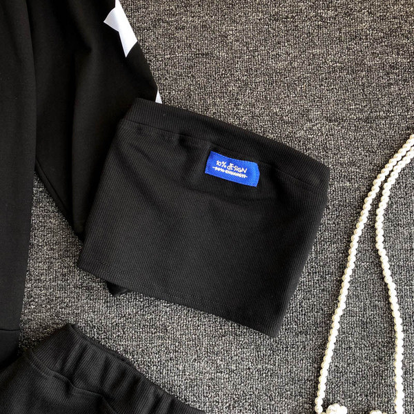 Női alkalmi szett szoknyával, rövid felsővel és pulóverrel