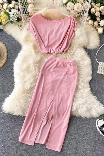 Naiste lõhikuga pluusi ja seeliku komplekt