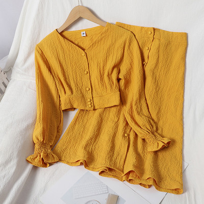 Két részből álló, gombos női szett