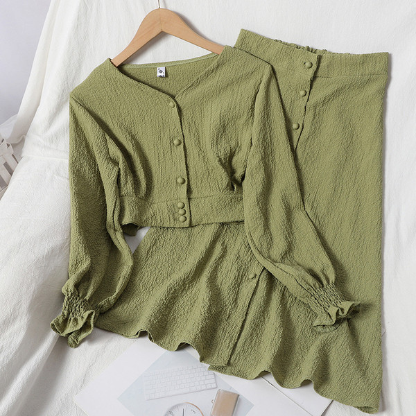 Két részből álló, gombos női szett