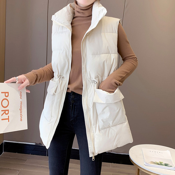 Kõrge krae ja taskutega vabaaja naistevest