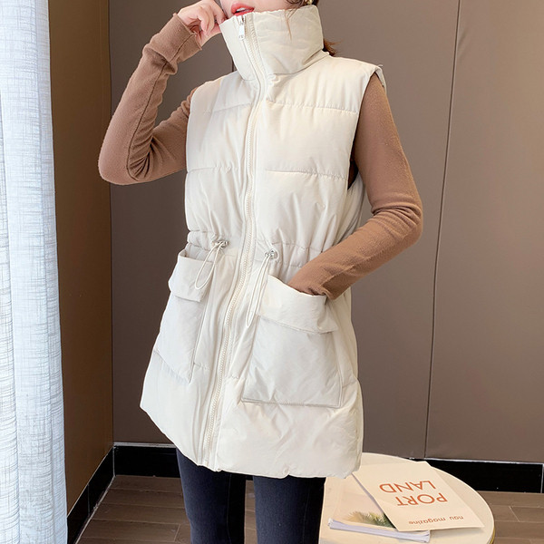 Kõrge krae ja taskutega vabaaja naistevest