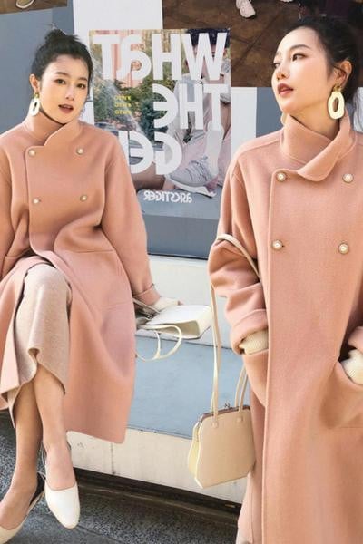 Pikk naiste mantel taskute ja nööpidega