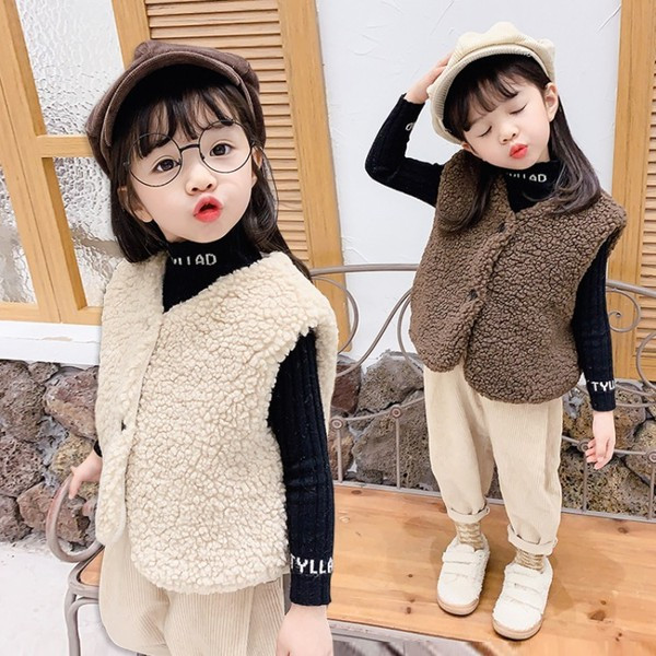 Gyermek pehelymellény gombokkal lányoknak