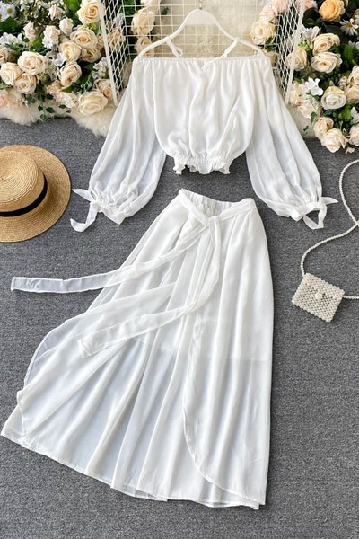 Valge naiste pluusi ja pika seeliku komplekt