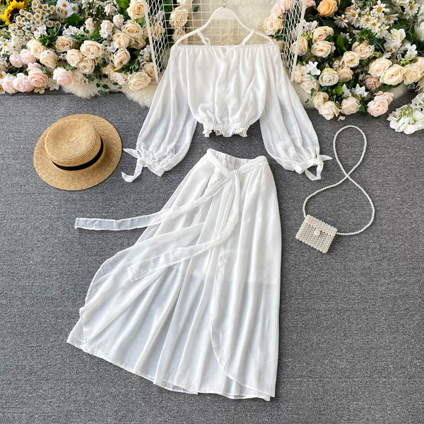 Valge naiste pluusi ja pika seeliku komplekt